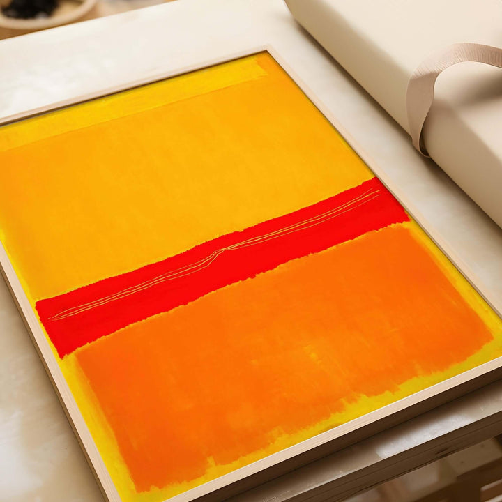 Mark Rothko No 5 No 22 Abstract Canvas Art Print Yellow Orange Red displayed on a table.