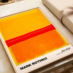 Mark Rothko No 5 No 22 Abstract Expressionist Print Red Orange Yellow Poster Wall Art displayed on a table.