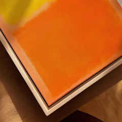 Mark Rothko Orange and Yellow 1956 Canvas Art Print detail on a framed canvas with warm orange hues.