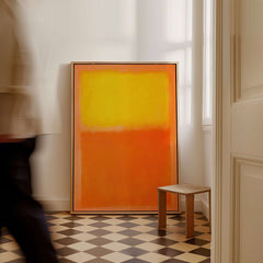 Mark Rothko Orange and Yellow 1956 Canvas Art Print displayed in a stylish room with a checkered floor.