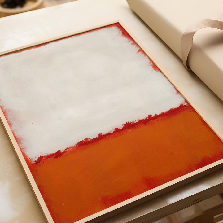 Mark Rothko Untitled 1969 Abstract Canvas Print - White Orange Color Field close-up of artwork on a table.