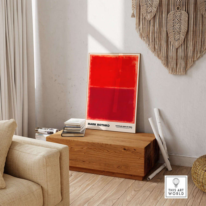 Mark Rothko Untitled Red on Red 1969 art print displayed on a wooden table in a modern living space.