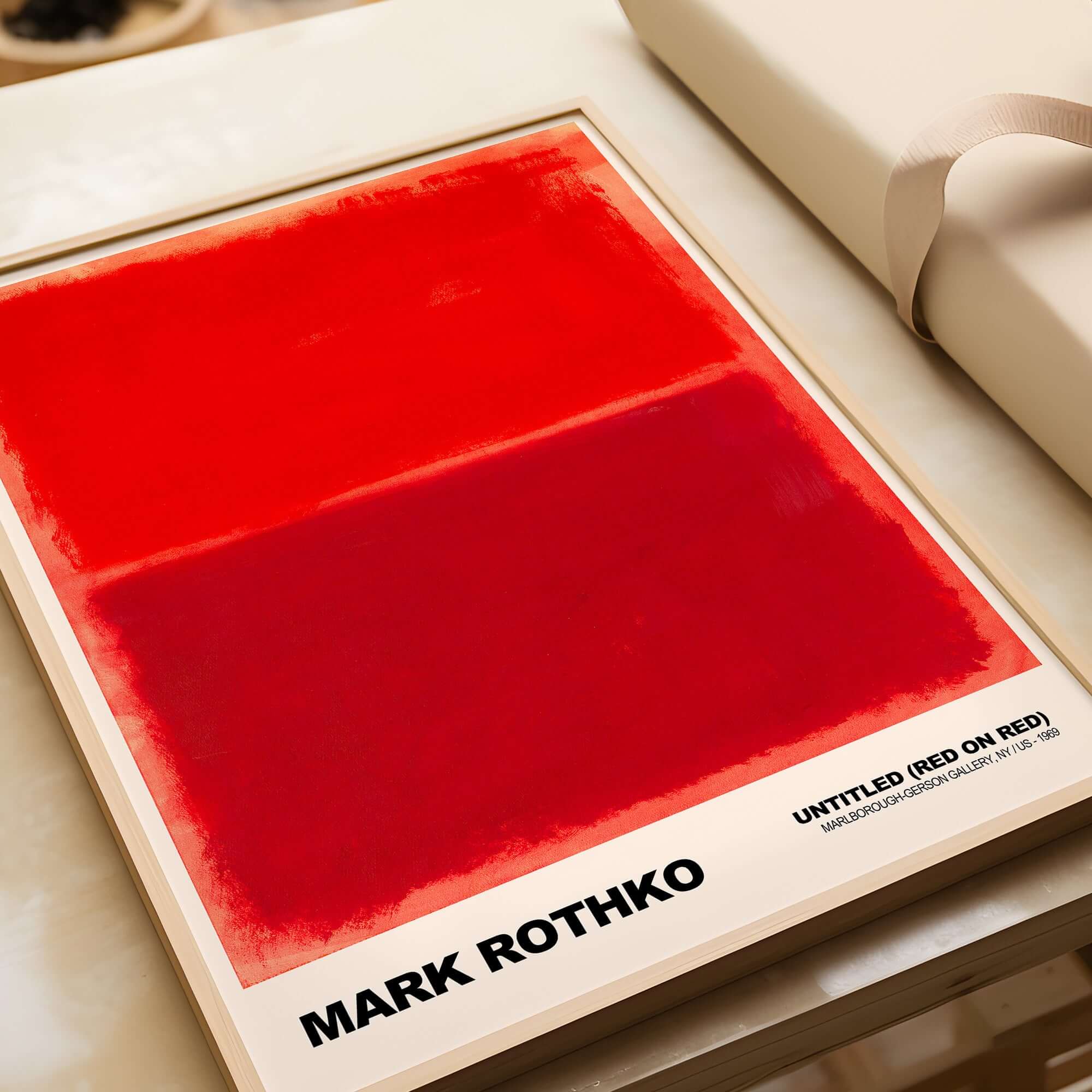 Mark Rothko Untitled Red on Red 1969 Abstract Art Print Color Field Painting Poster displayed on a table.