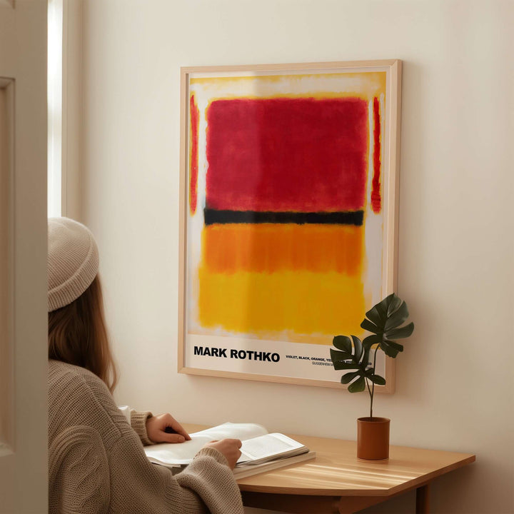 Mark Rothko 1949 abstract art print featuring red, yellow, and black colors displayed in a modern interior setting.