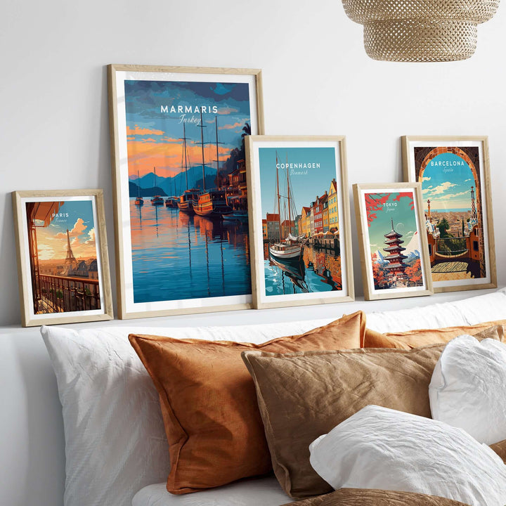 Marmaris Marina poster collection with vibrant sunset and yacht art prints framed on a cozy couch.