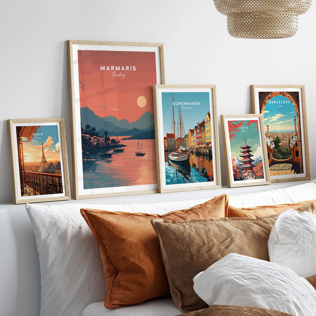 Gallery wall featuring Marmaris Turkey sunset poster and travel prints from Copenhagen and Barcelona.
