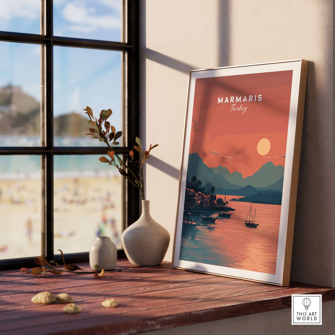 Marmaris Bay sunset poster framed on a windowsill, showcasing vibrant coastal colors and serene landscape.