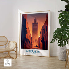 Marrakesh Morocco Canvas Print | Sunset Camels Poster displayed in a stylish interior setting with palm plants.