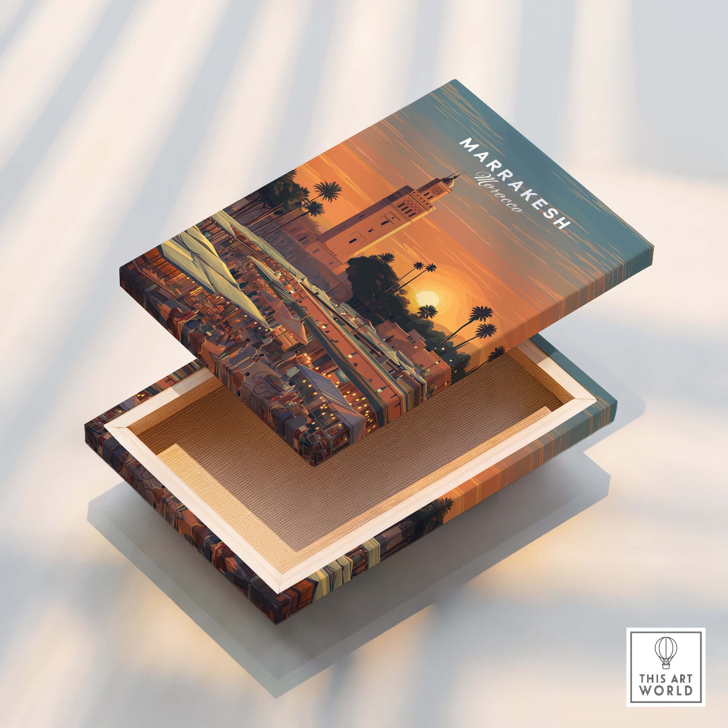 Marrakesh Morocco Travel Poster | Vibrant Souk & Mosque Wall Art Print displayed on a decorative box.