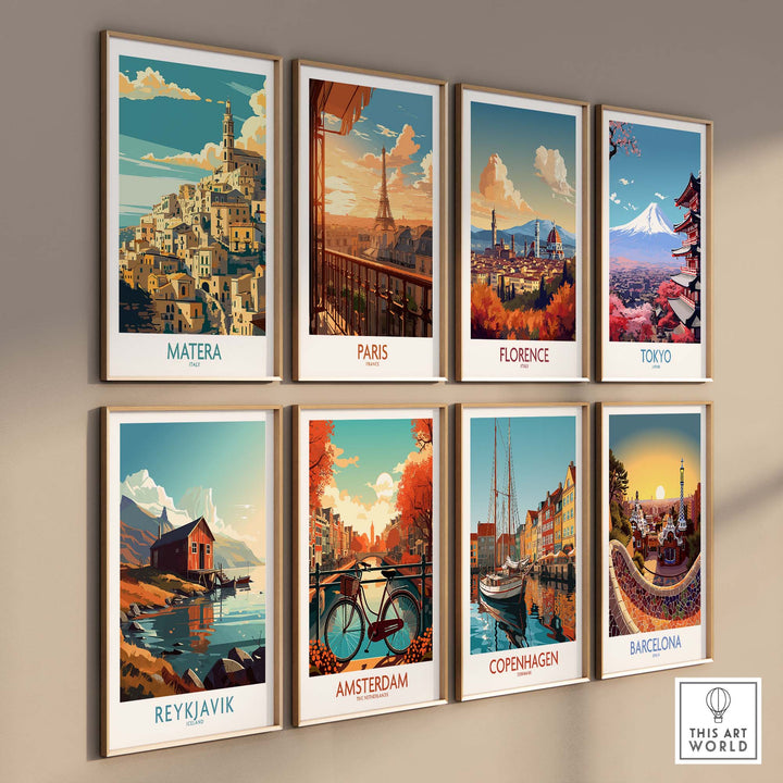 Collection of travel posters including Matera Italy, Paris, Florence, Tokyo, Reykjavik, Amsterdam, Copenhagen, and Barcelona displayed on a wall