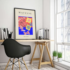 Matisse Art Prints - Abstract Face with Flowers Collage Wall Art displayed in a modern workspace, featuring vibrant colors.