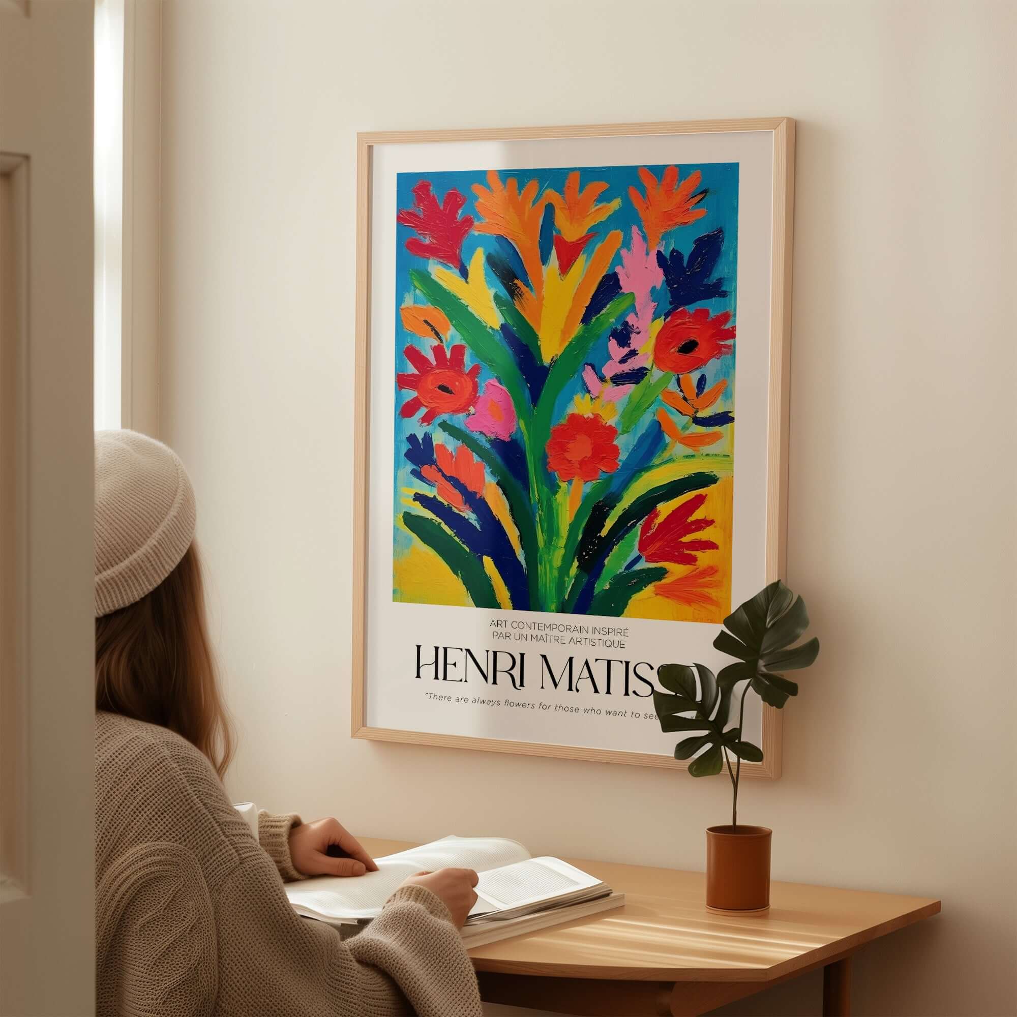 Matisse Art Prints - Abstract Floral Bouquet Print displayed in a cozy room with a person admiring the vibrant artwork.