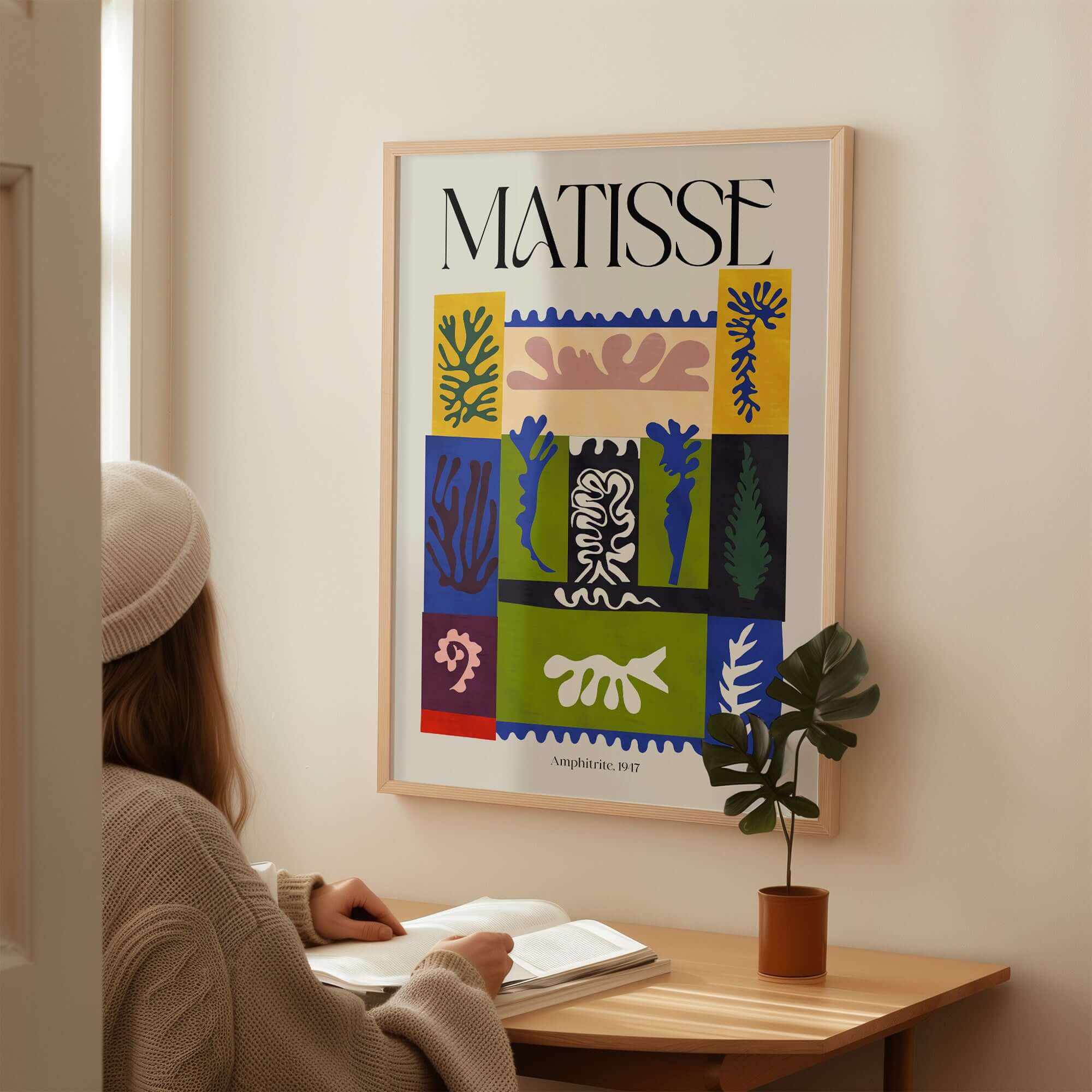 Matisse Amphitrite 1947 Abstract Patchwork Poster Print displayed on wall above a person sitting at a desk.