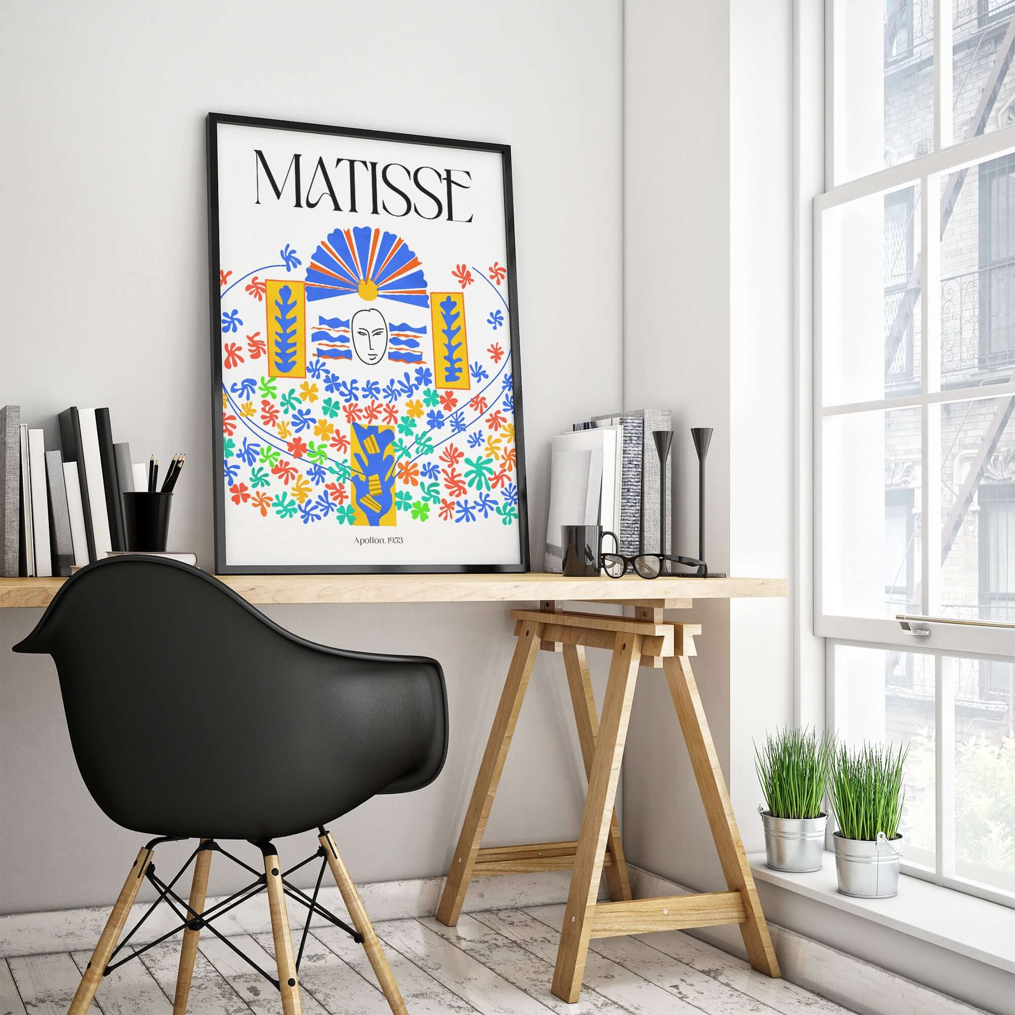 Matisse Apollon 1953 Decorative Cut Out Wall Art Print displayed in a modern workspace with black chair and potted plants.