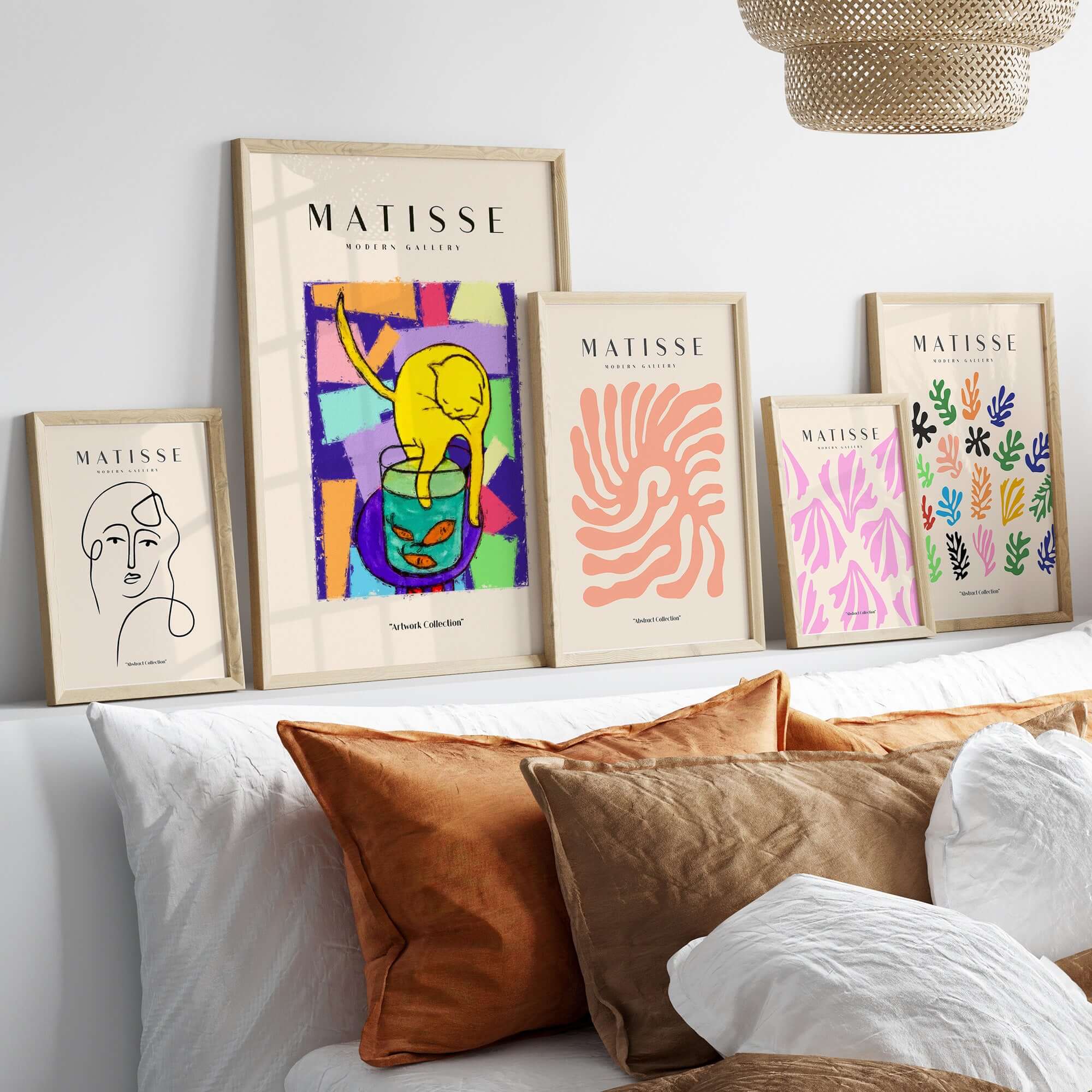 Matisse Art Prints - Yellow Cat with Fishbowl Geometric Poster displayed on a modern wall shelf with other art prints.