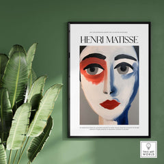 Matisse Art Prints - Abstract Face Portrait Poster showcasing a striking abstract face in bold colors against a green wall.