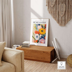 Matisse Art Prints - Abstract Flowers Poster showcased in modern living room decor with natural elements.