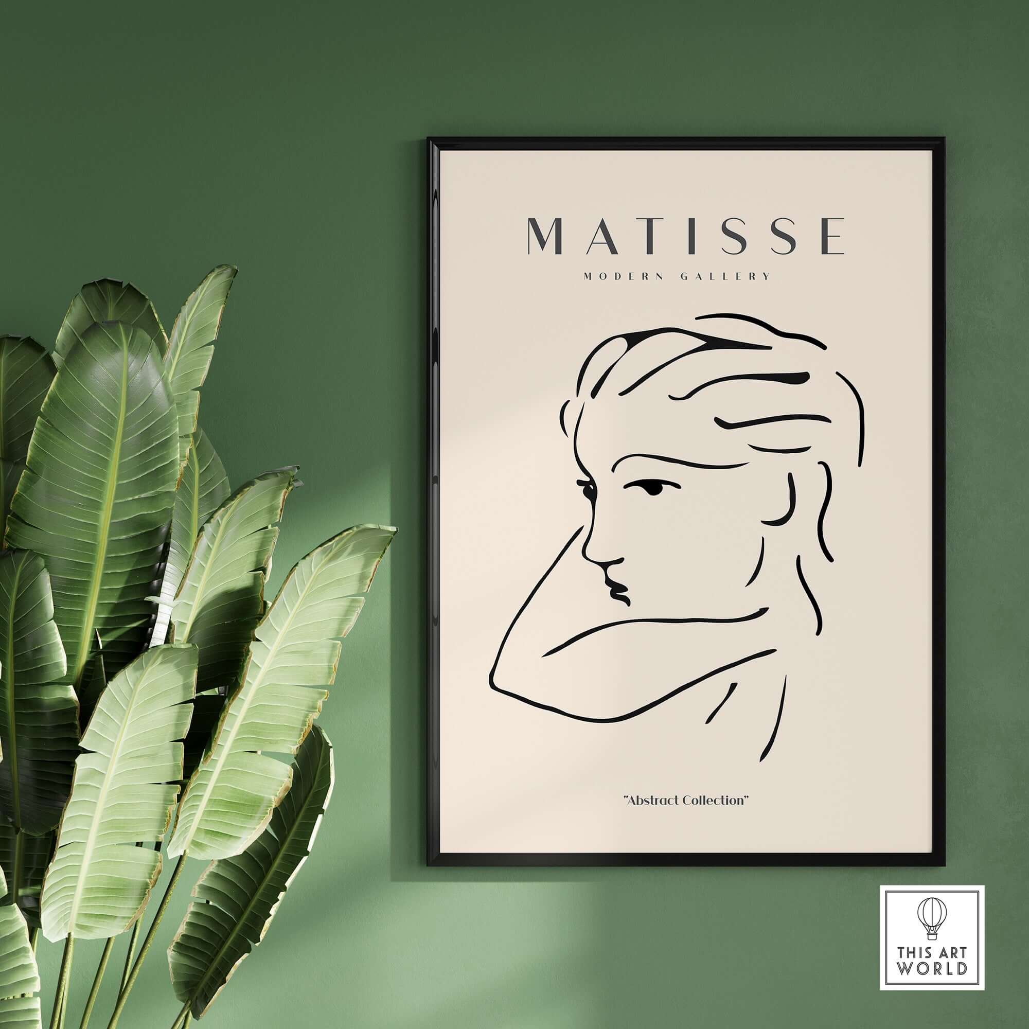 Matisse Art Prints - Abstract Line Drawing of Lady framed art print displayed on a green wall next to large leaves.