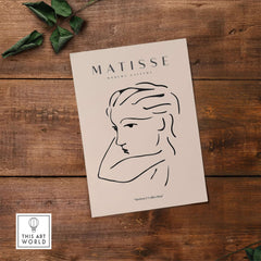 Matisse Art Prints - Abstract Line Drawing of Lady featuring minimalist line art portrait on beige background.