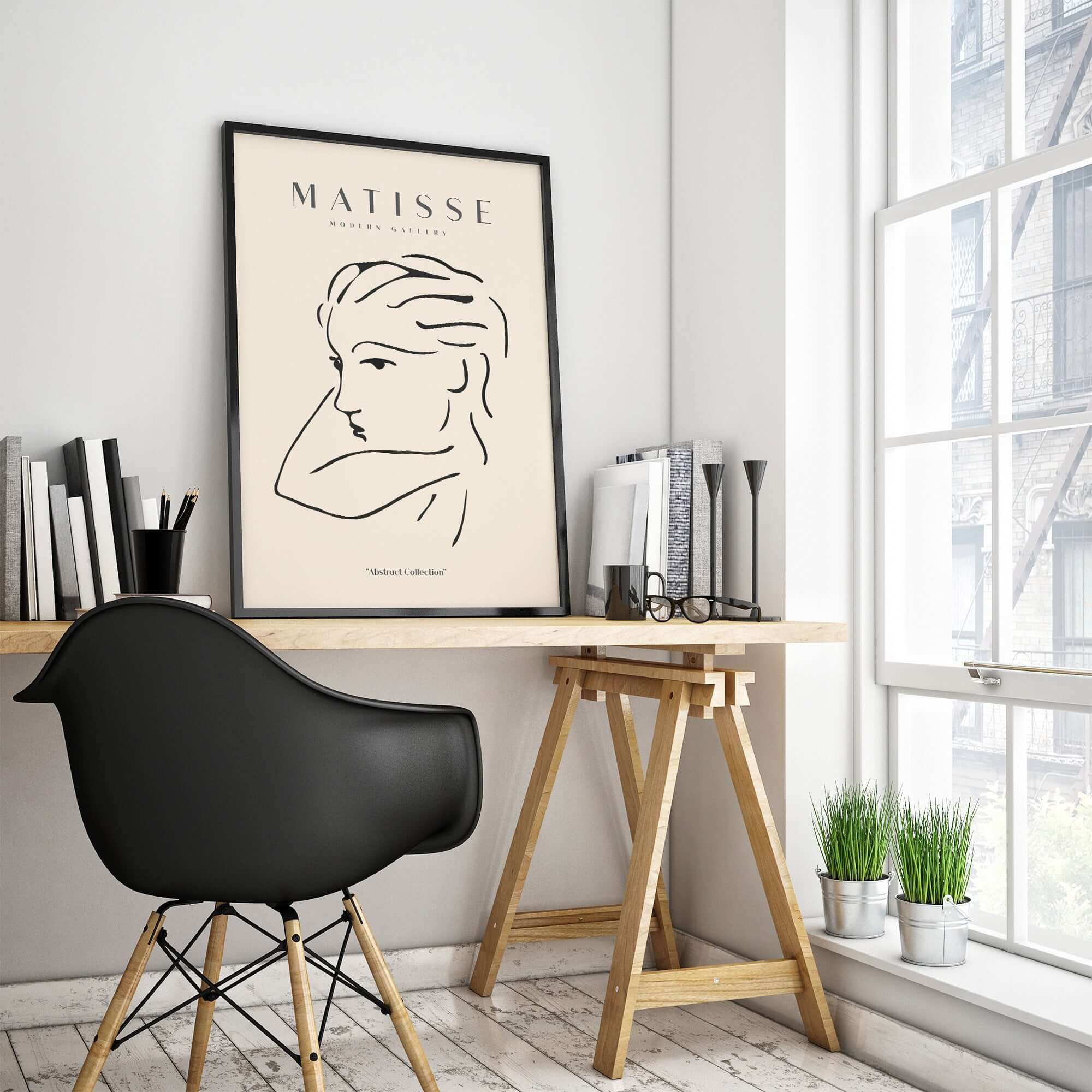 Matisse Art Prints - Abstract Line Drawing of Lady displayed in a modern workspace with natural light and minimal decor.