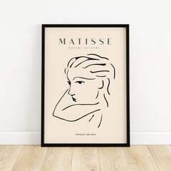 Matisse Art Prints - Abstract Line Drawing of Lady framed artwork featuring a continuous line portrait on beige.