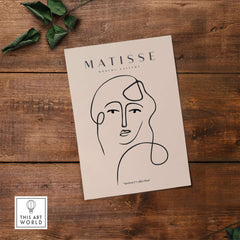 Matisse Art Prints - Continuous Line Abstract Face Poster featuring a minimalist line art portrait on beige.