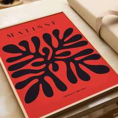 Matisse Art Prints -  Black Abstract Coral Shape Red Poster framed art print showcasing bold coral design against red.