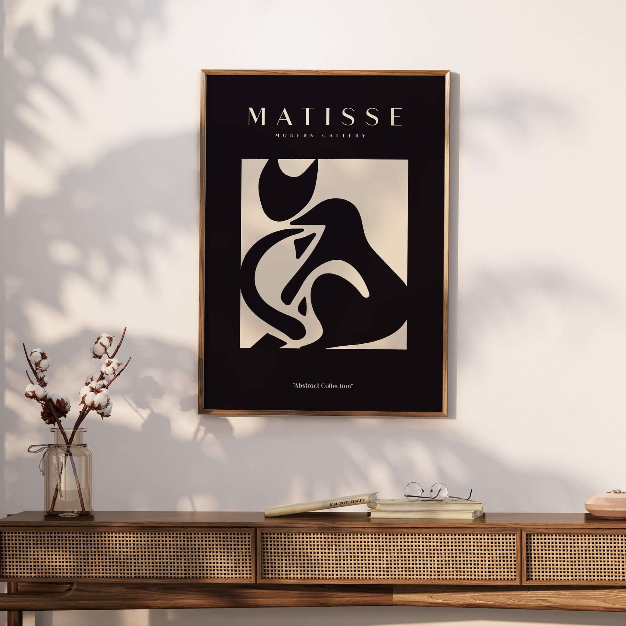 Matisse Art Prints - Black Beige Abstract Composition Poster displayed on a wall with a stylish wooden console table.
