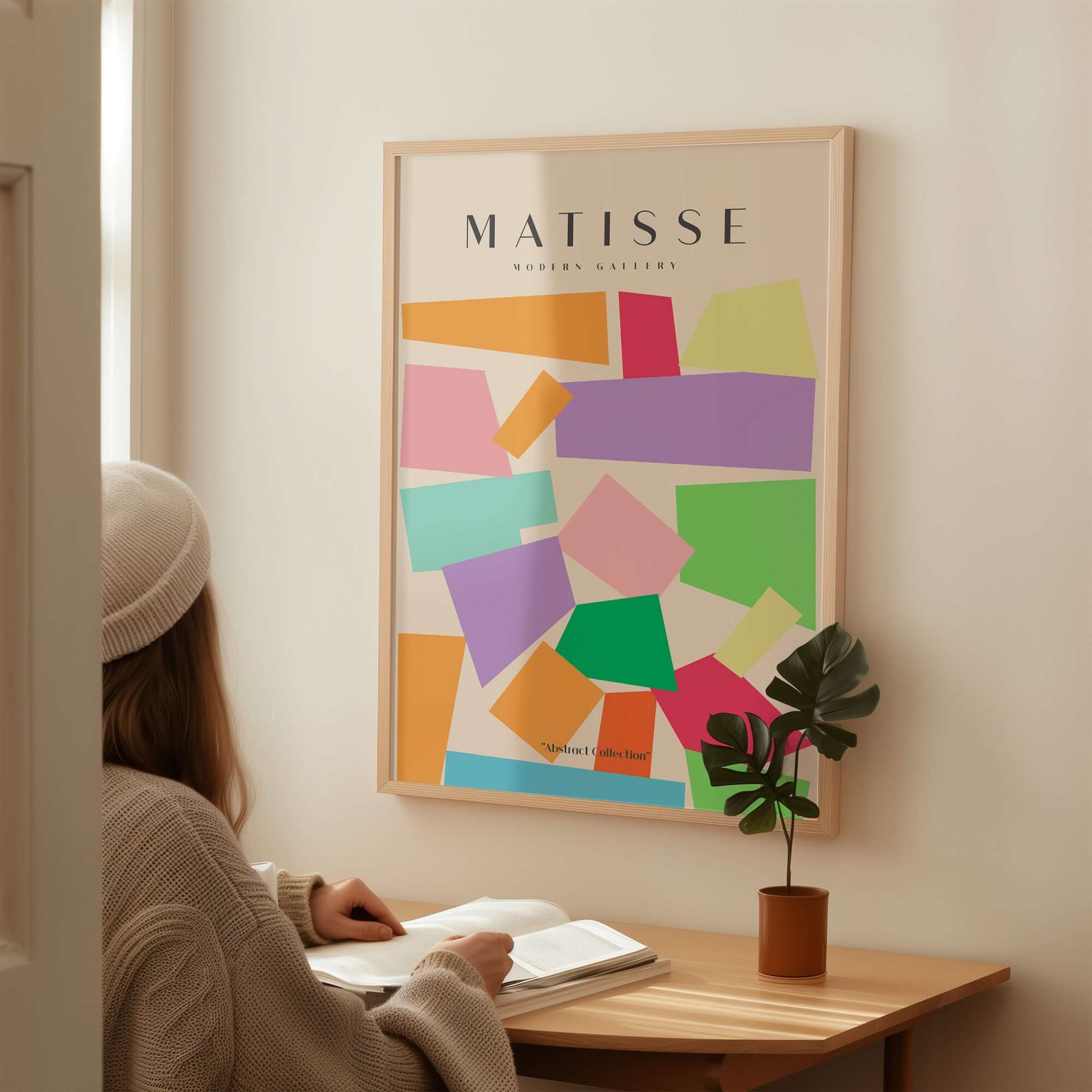 Matisse Art Prints - Colorful Geometric Shapes Abstract Print displayed in a modern room with a person reading.