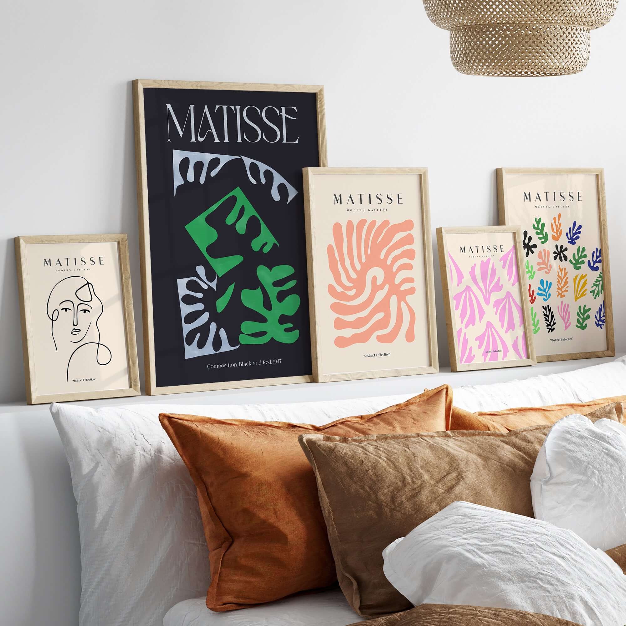 Matisse Art Print Composition Black Green White Abstract Poster 1947 displayed on a modern shelf with decorative pillows.