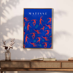 Matisse Art Prints -  Dancing Figures Pattern Red Blue Poster showcasing vibrant cut-out style with red dancing figures and teal leaves.