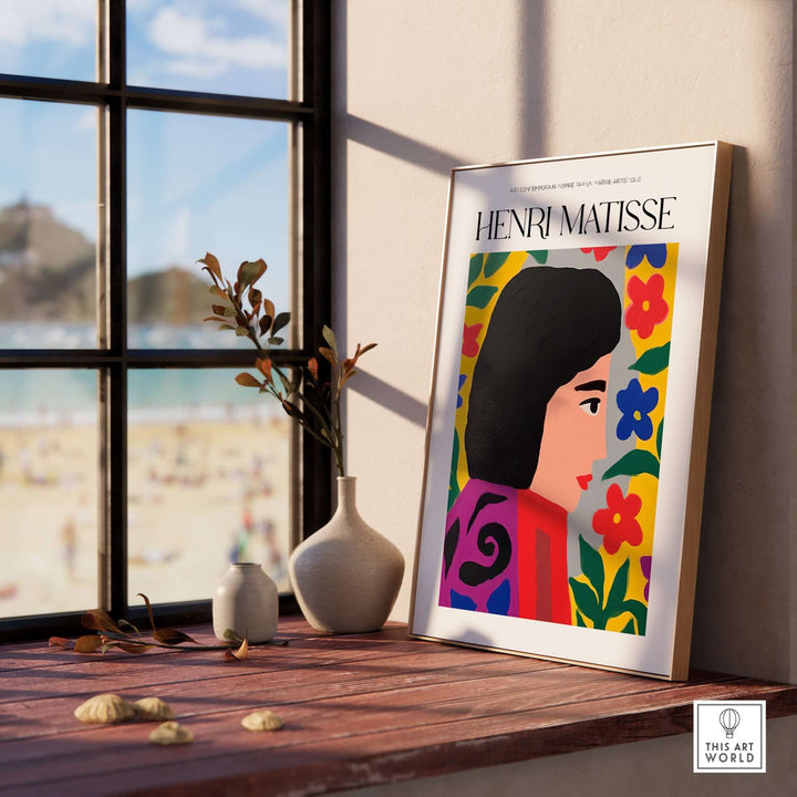 Matisse art print featuring a floral woman portrait in vibrant colors displayed on a rustic window sill.