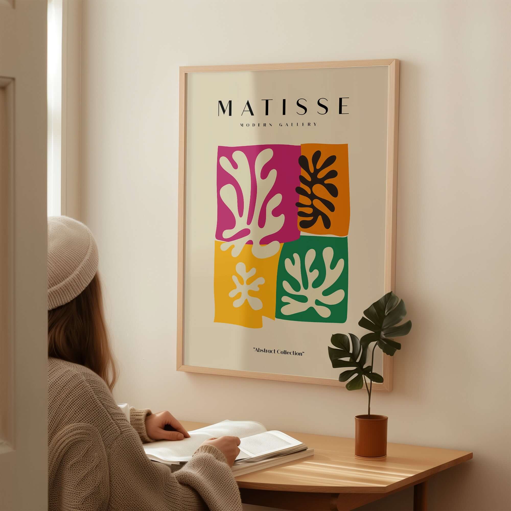 Matisse Art Prints - Four Block Abstract Leaves Poster displayed in a modern setting, featuring colorful abstract leaf designs.