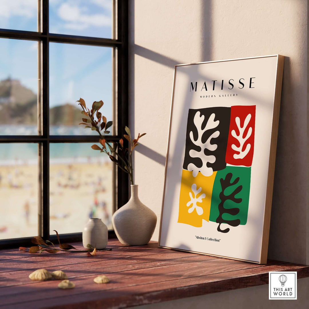 Matisse art print with four colored blocks depicting abstract leaves, framed by sunlight in a coastal setting.