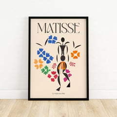Matisse Art Print - La Négresse 1952 Poster featuring vibrant colors and abstract figures in a decorative frame.