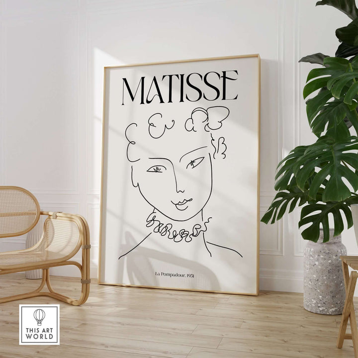 Minimalist Henri Matisse La Pompadour art print showcasing a female portrait line drawing in a stylish interior.