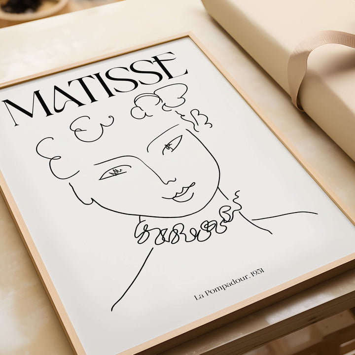 Matisse art print La Pompadour 1951, minimalist line drawing of a female portrait in elegant black lines.