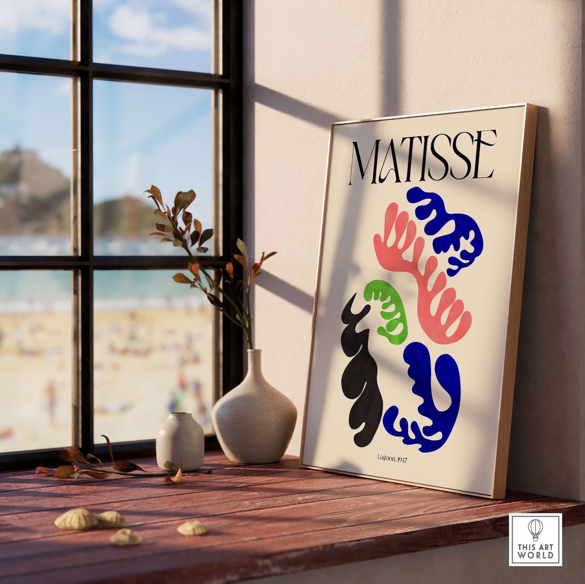 Matisse Art Print Lagoon 1947 Abstract Organic Shapes Wall Art Print displayed on a windowsill with beach view.