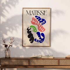 Matisse Art Print Lagoon 1947 Abstract Organic Shapes Wall Art Print displayed on a wall above a stylish wooden side table.