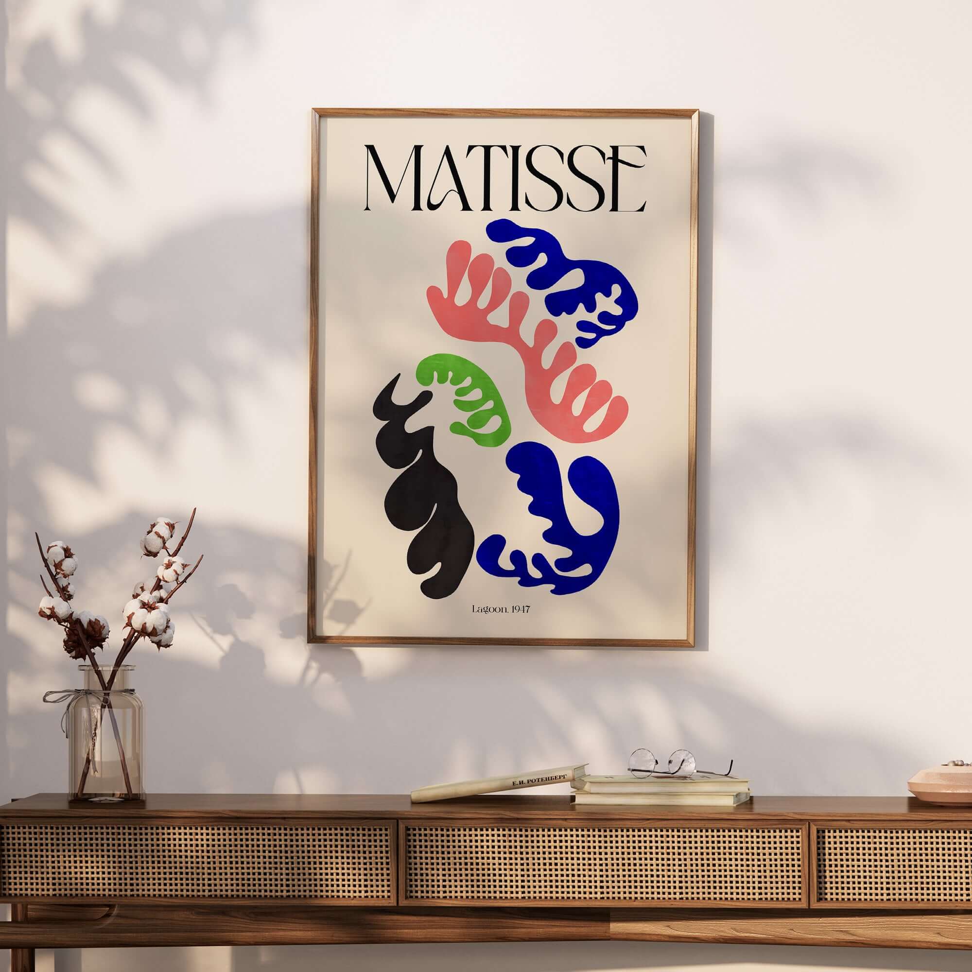Matisse Art Print Lagoon 1947 Abstract Organic Shapes Wall Art Print displayed on a wall above a stylish wooden side table.