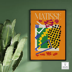 Matisse Art Print - Les Codomas Jazz 1947 Abstract Cut Out Art Poster framed on a green wall with plants.