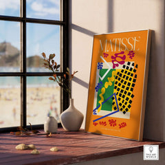 Matisse Art Print - Les Codomas Jazz 1947 Abstract Cut Out Art Poster displayed in a bright interior near a window.