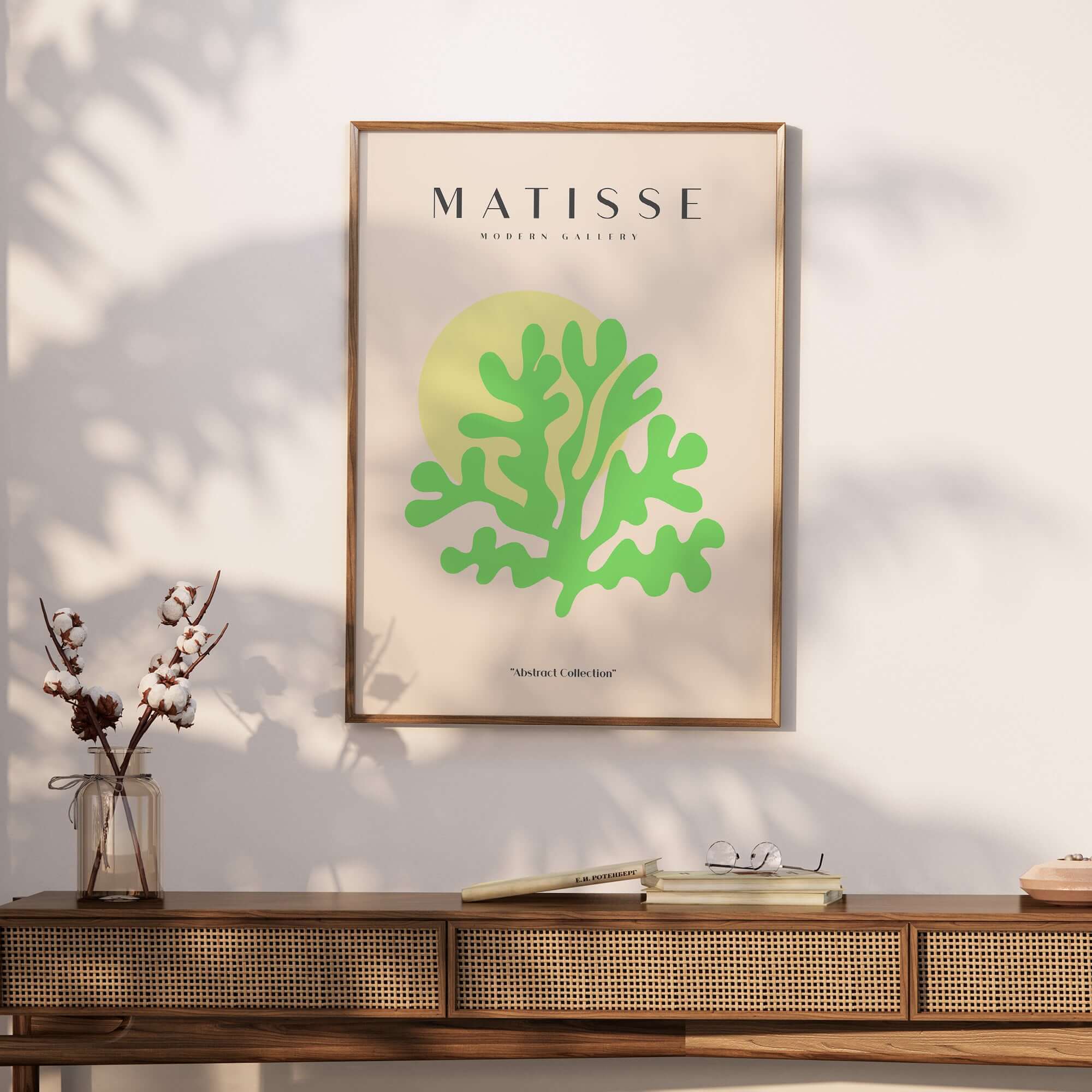 Matisse Art Prints - Lime Green Coral Abstract Sun Print displayed on a wall above a wooden table with decor accents.