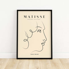 Matisse Art Prints -  Line Art of a Lady's Face Poster featuring minimalist line drawing on beige background.