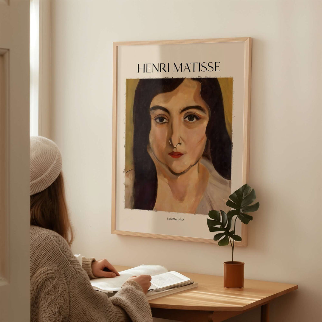 Henri Matisse art print 'Lorette' displayed on a wall, showcasing vibrant colors and expressive portraiture.