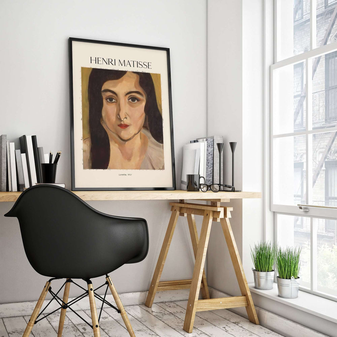 Henri Matisse Lorette 1917 portrait art print displayed on a desk in a bright, modern workspace.
