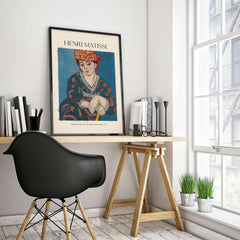 Matisse Art Print - Madras Rouge Red Headdress 1907 Wall Art Poster displayed in a stylish workspace.