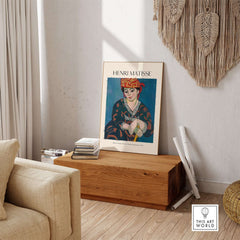 Matisse Art Print - Madras Rouge Red Headdress 1907 Wall Art Poster displayed in a modern living room setting.
