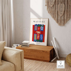 Matisse Art Prints - Patchwork Shapes Composition Poster displayed in a modern living room, showcasing colorful abstract designs.