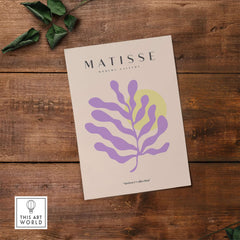 Matisse Art Prints - Purple Botanical Abstract Poster featuring vibrant purple shapes and a yellow circle on beige background.